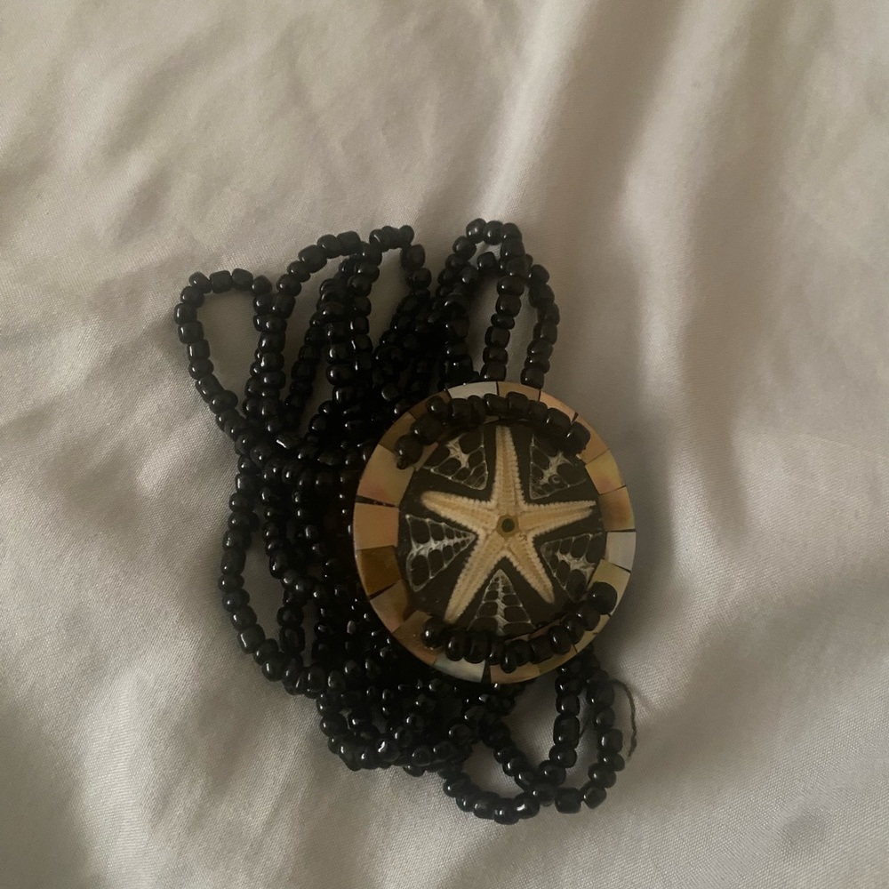 Black Beaded bracelet with Star Pendant
